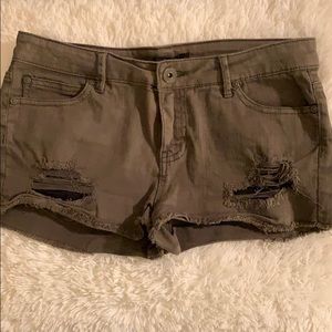 Olive green studded jean shorts